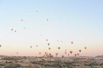 Hot air balloons at sunrise in Cappadocia, Türkiye (Turkey)