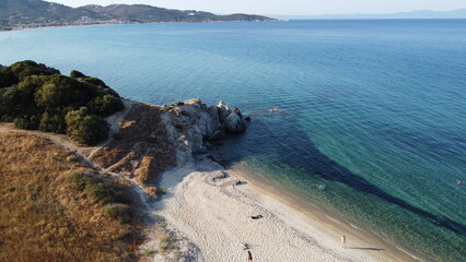 Obraz premium Aerial View of Secluded Beach with Crystal Clear Water