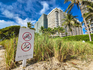 Miami Beach, Florida, USA - A no cycling or dog walking sign on one of the trails at Bal Harbour beach