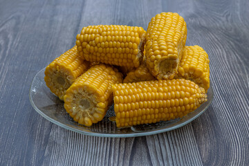 Boiled fresh corn on a plate.