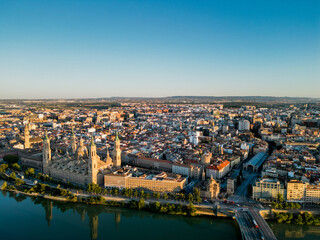 	
Spectacular Zaragoza city skyline at sunset. View of old town center, Cathedral of Zaragoza and Ebro River. Medieval and historic travel destination in Aragon - Spain. Sunset point, orange reflectio