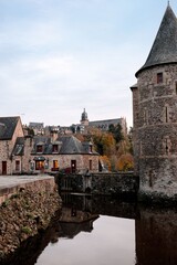 Naklejka premium Vertical view of Fougeres Castle and the nearby medieval buildings in Fougeres, France