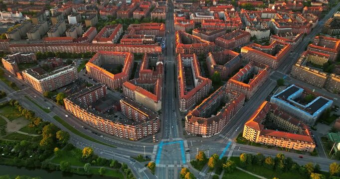 Aerial drone view of Amagerbro area in the northern part of the island Amager in Copenhagen, Denmark at sunset