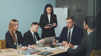 Business team discussing strategy, important matters and strategizing for future projects. Leader giving instructions during meeting. Concept of teamwork, collaboration, and project management