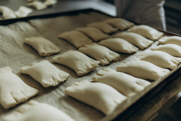Baking pies with jam at a bakery