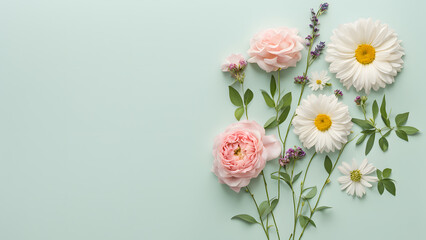A green background with a bunch of flowers on it
