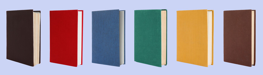 Many books with colorful hardcovers on light blue background, set