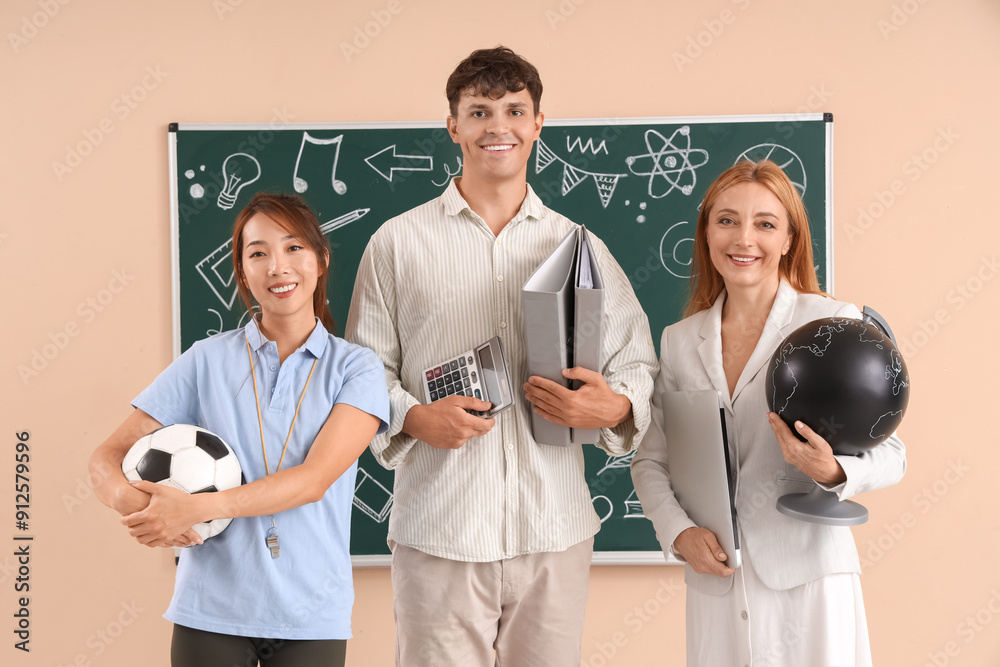 Canvas Prints Teachers near blackboard in classroom