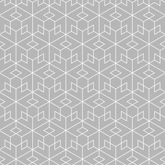 Seamless geometric pattern consisting of hexagon shapes with isometric cubes on a gray background. Suitable for various design purposes, textiles, wallpapers, backgrounds, etc.