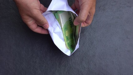 Paying a lot of Euros in cash, corruption symbolic