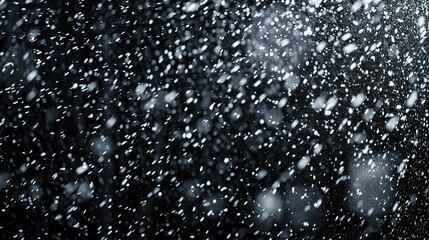 Obraz premium snowfall, stock imagery, on plain black background 