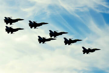 Military fighters, defenders of the sky, in flight