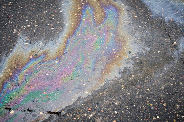 Overhead View of a Vibrant Oil Slick on Wet Asphalt