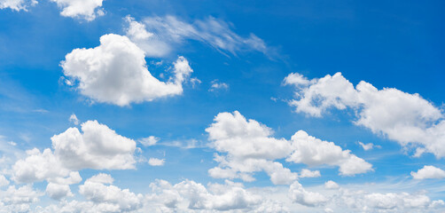 Fototapeta premium white clouds and blue sky background, panoramic view