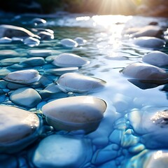 Fototapeta premium white-stones-in-blue-shiny-water-with-sunlight-reflections