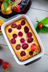 Sweet cottage cheese casserole with strawberry filling