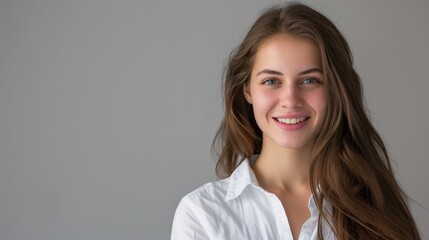 Fototapeta premium Beautiful young business woman portrait smiling cute girl with long hair studio shot isolated on gray background. A.I.