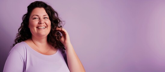 Happiness. Cheerful plump woman laughing and posing standing on purple studio background. Self-love and body positivity concept.