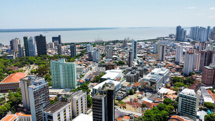 aerial shot of the city with a river behind