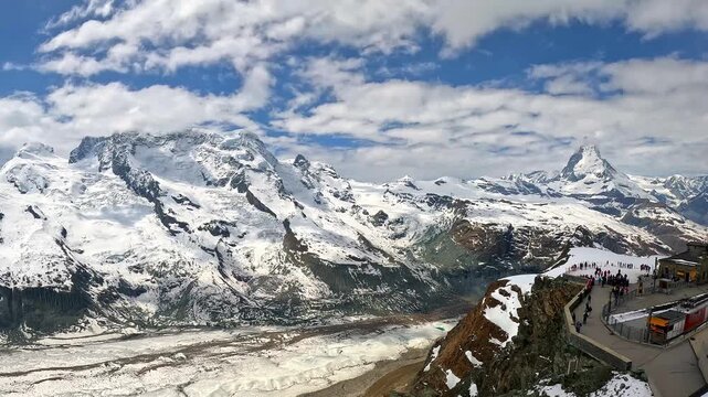 Summit station with tourists at Gornergrat Matterhorn and Gorner Glacier in Switzerland
