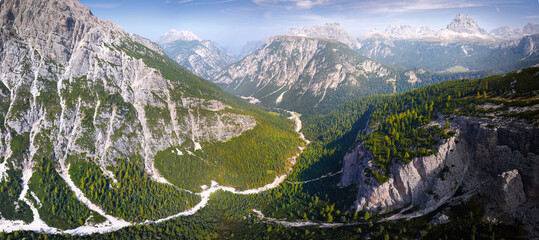 Majestic Mountain Landscape with Verdant Forests and Winding Trails - Ideal for Nature and Travel Projects. Dolomites, Tre Cime area, Italy.