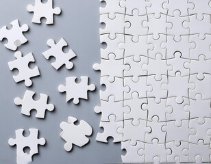 Cut off white puzzle pieces