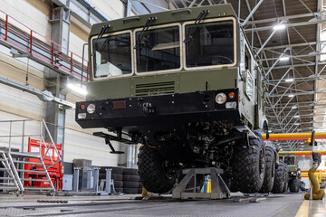 Conveyor for the production of multi-axle cross-country vehicles. Plant workshop.