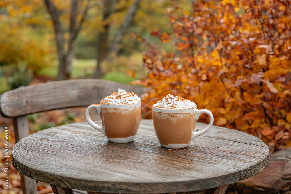 Poster Rustic Autumn Setting with Pumpkin Spice Lattes Outdoors  