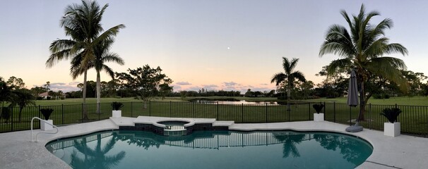 Sunrise over Lake, Golf Course and Swimming Pool in West Palm Beach, Florida