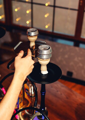 Colorful hookah on bokeh background close up