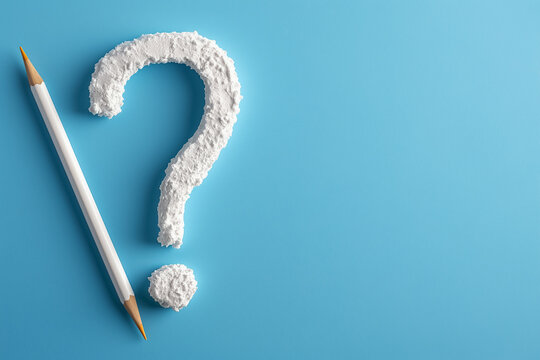 Artwork creatively illustrates a Question Mark using colorful pencils set against a vibrant blue chalkboard background