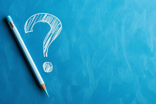 Artwork creatively illustrates a Question Mark using colorful pencils set against a vibrant blue chalkboard background