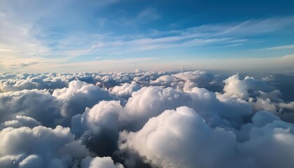 Naklejka premium flight over the clouds. view of the clouds from the airplane window
