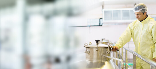 Quality control supervisor checking and collecting food and beverage producing data.