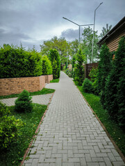 A stone walkway in an open-air park.