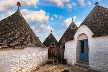 The traditional Trulli houses in Alberobello city, Apulia, Italy. Cityscape over the traditional roofs of the Trulli, original and old houses of this region, Apulia, Alberobello, Puglia, Italy.