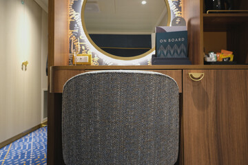 Luxurious interior or inside cabin stateroom on luxury ocean cruiseship or cruise ship liner in...