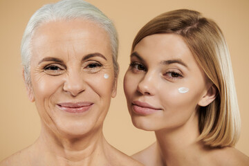 A cheerful connection shared between a mother and her daughter showcasing beauty.