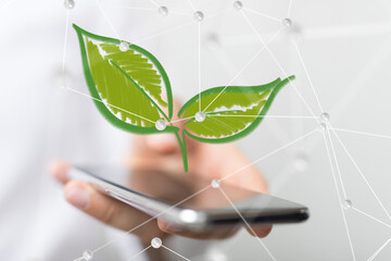 Obraz premium green world power in hand recycling