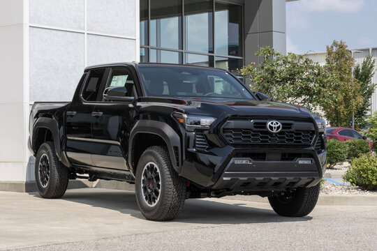 Toyota Tacoma TRD Offroad Pickup display. Toyota offers the Tacoma with a 2.4L Turbo iForce 4-Cylinder engine. MY:2024