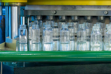 The plastic jar bottle manufacturing process by vertical blow mold machine.