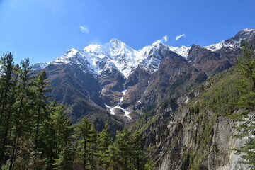 Obraz premium The dramatic scenery and landscapes while trekking the Annapurna Circuit in the Himalayas, Nepal 