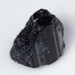 natural black tourmaline scherl on the white background