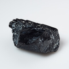 natural black tourmaline scherl on the white background