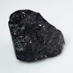 natural black tourmaline scherl on the white background