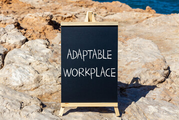 Adaptable workplace symbol. Concept words Adaptable workplace on beautiful yellow blackboard....