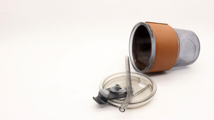 Tumbler in the form of a glass or glass mug with a modern design