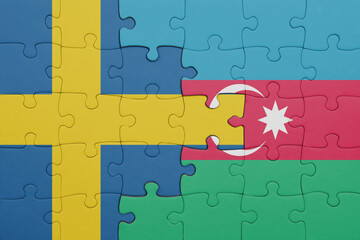 puzzle with the colourful national flag of azerbaijan and flag of sweden.