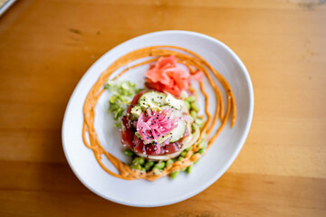 Tuna Poke Rice tower at gourmet beachfront restaurant 