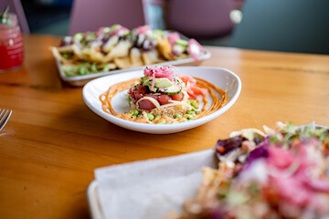 Tuna Poke Rice tower at gourmet beachfront restaurant 
